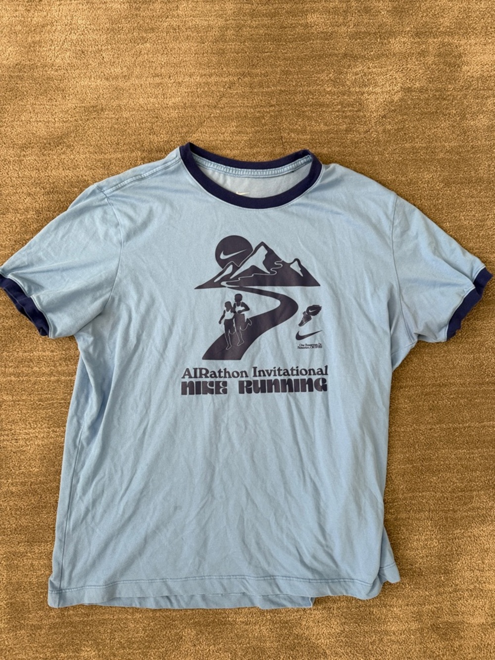Nike Light Blue Ringer Tee with Running graphic